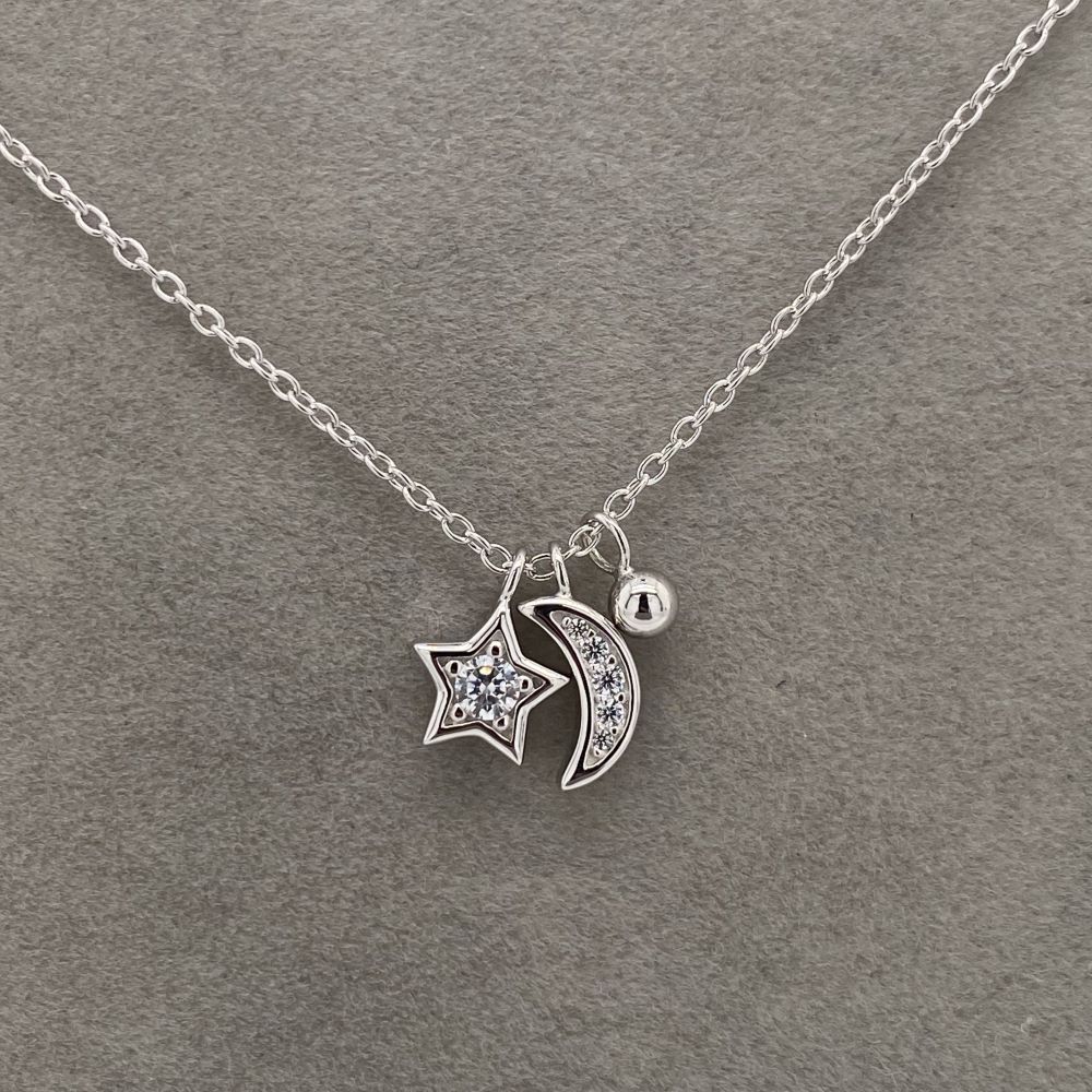 H3121-45 sterling silver cz set star moon and sun triple necklace front main image